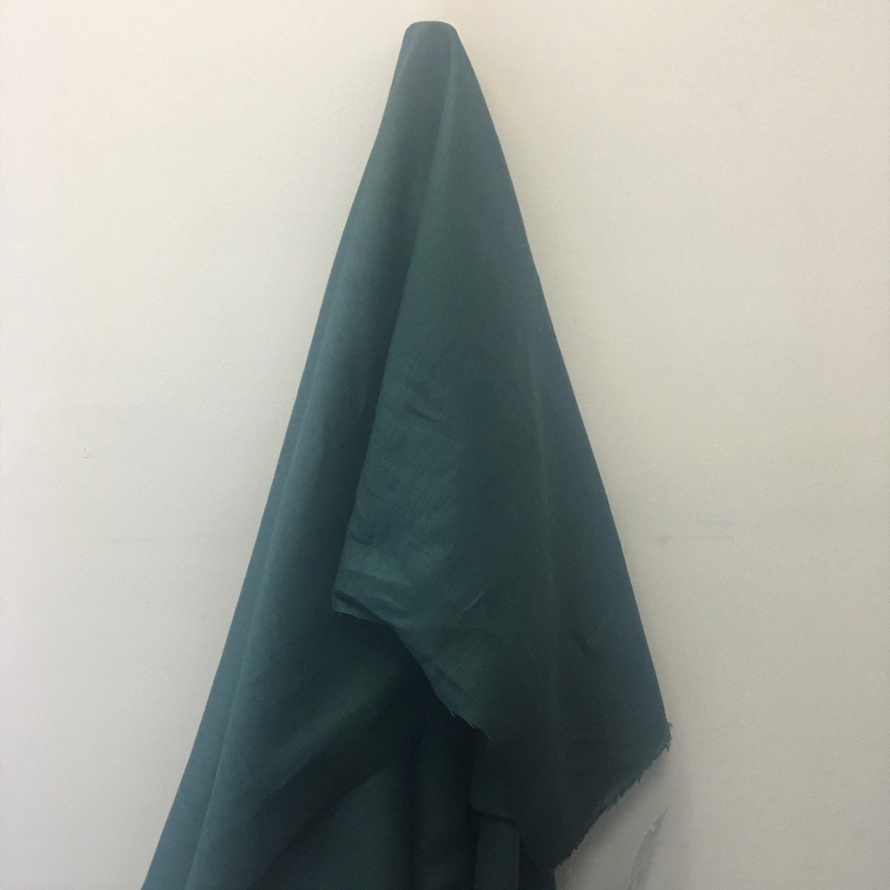 Bottle Green Linen — mid-weight plain-weave linen with a slightly crisp handle that softens with wear, 100% linen, 135cm wide
