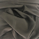 Charcoal Linen — mid-weight plain-weave linen with a slightly crisp handle that softens with wear, 100% linen, 135cm wide