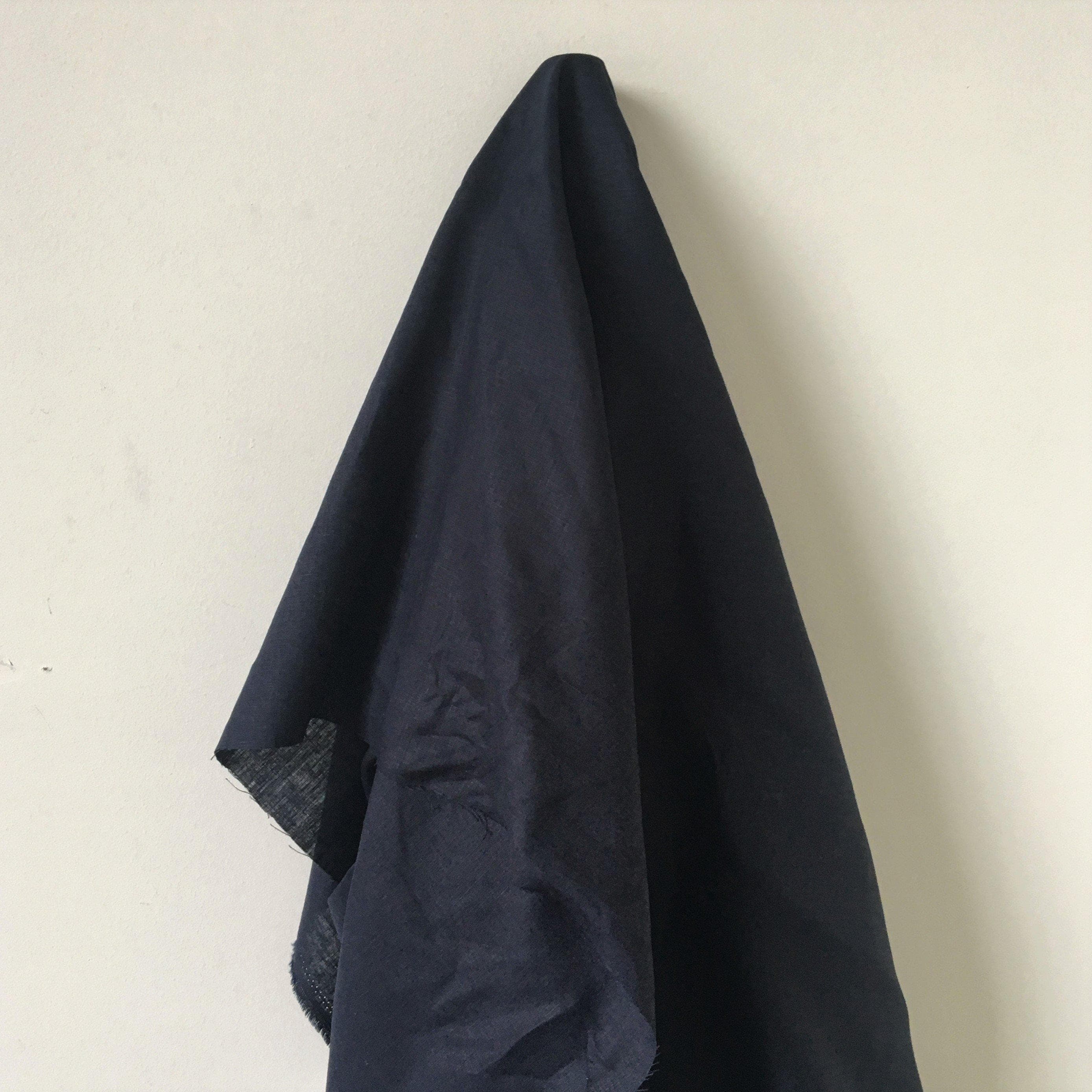 Navy Linen — mid-weight plain-weave linen with a slightly crisp handle that softens with wear, 100% linen, 135cm wide