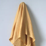 Sunflower Linen — mid-weight plain-weave linen with a slightly crisp handle that softens with wear, 100% linen, 135cm wide
