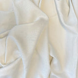 Cream Linen — mid-weight plain-weave linen with a slightly crisp handle that softens with wear, 100% linen, 135cm wide