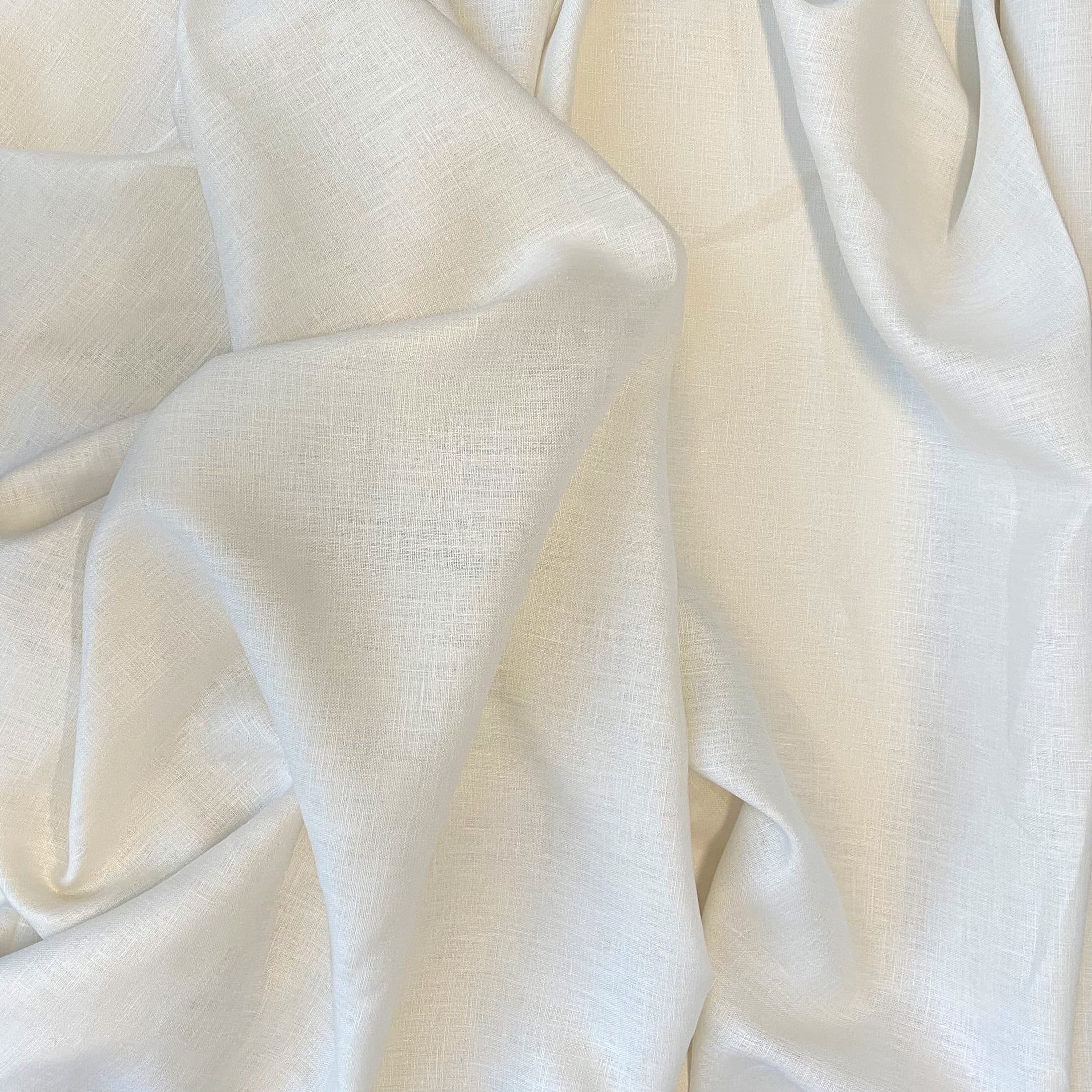 Cream Linen — mid-weight plain-weave linen with a slightly crisp handle that softens with wear, 100% linen, 135cm wide