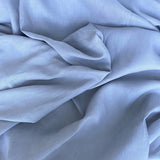 Dove Linen — mid-weight plain-weave linen with a slightly crisp handle that softens with wear, 100% linen, 135cm wide