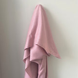 Dusty Pink Linen — mid-weight plain-weave linen with a slightly crisp handle that softens with wear, 100% linen, 135cm wide