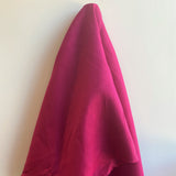 Lipstick Linen — mid-weight plain-weave linen with a slightly crisp handle that softens with wear, 100% linen, 135cm wide