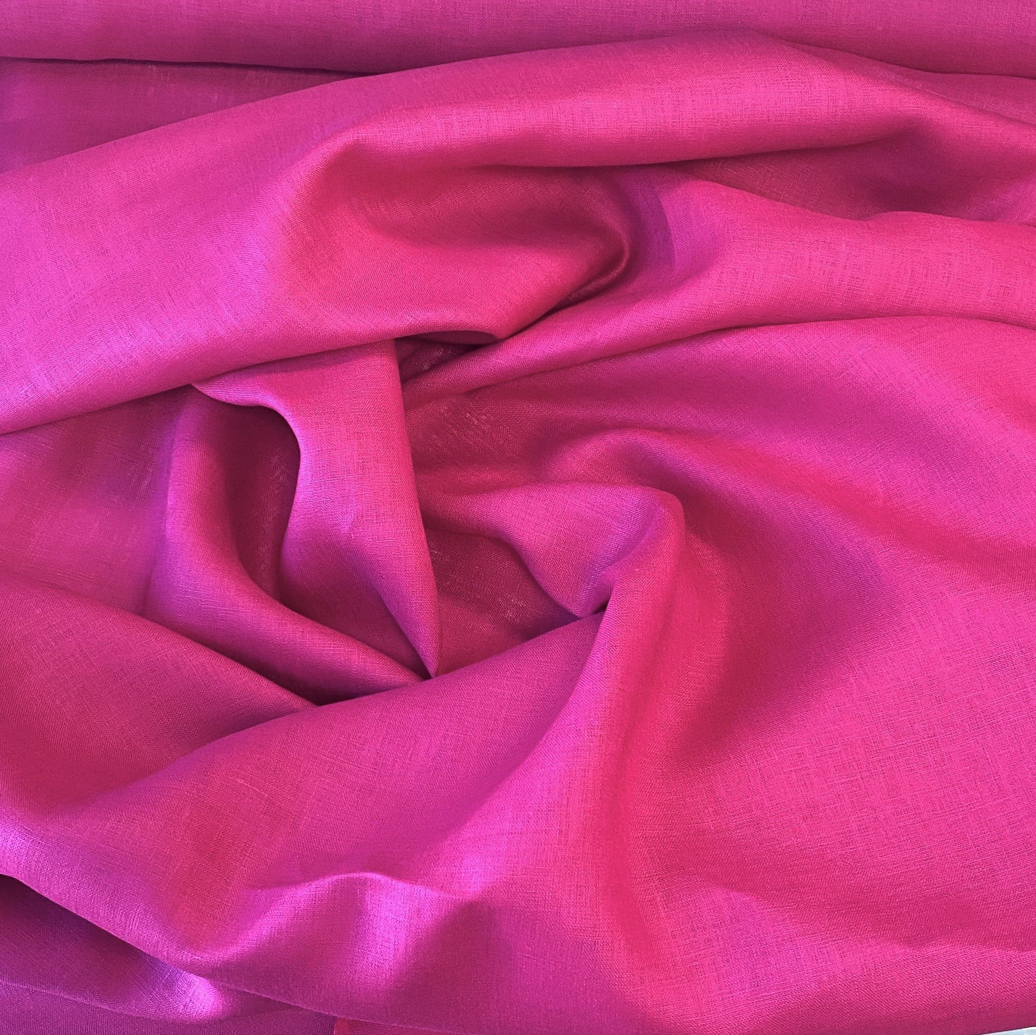 Lipstick Linen — mid-weight plain-weave linen with a slightly crisp handle that softens with wear, 100% linen, 135cm wide