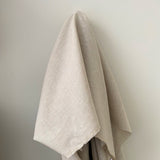 Oat Linen — mid-weight plain-weave linen with a slightly crisp handle that softens with wear, 100% linen, 135cm wide