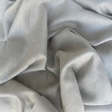 Sand Linen — mid-weight plain-weave linen with a slightly crisp handle that softens with wear, 100% linen, 135cm wide