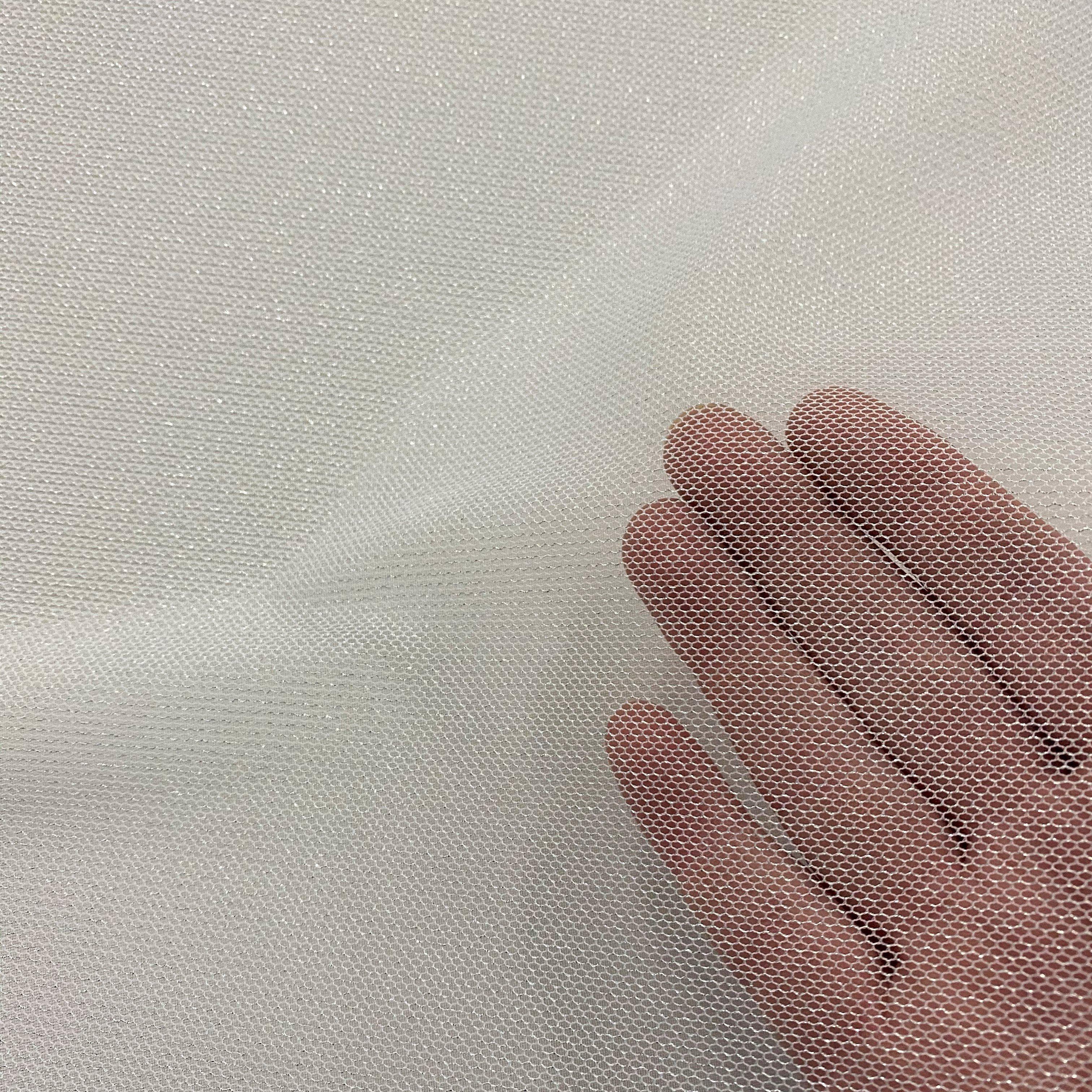 Ivory Silver Lurex Tulle — soft, 90% polyester 10% lurex, 137cm wide