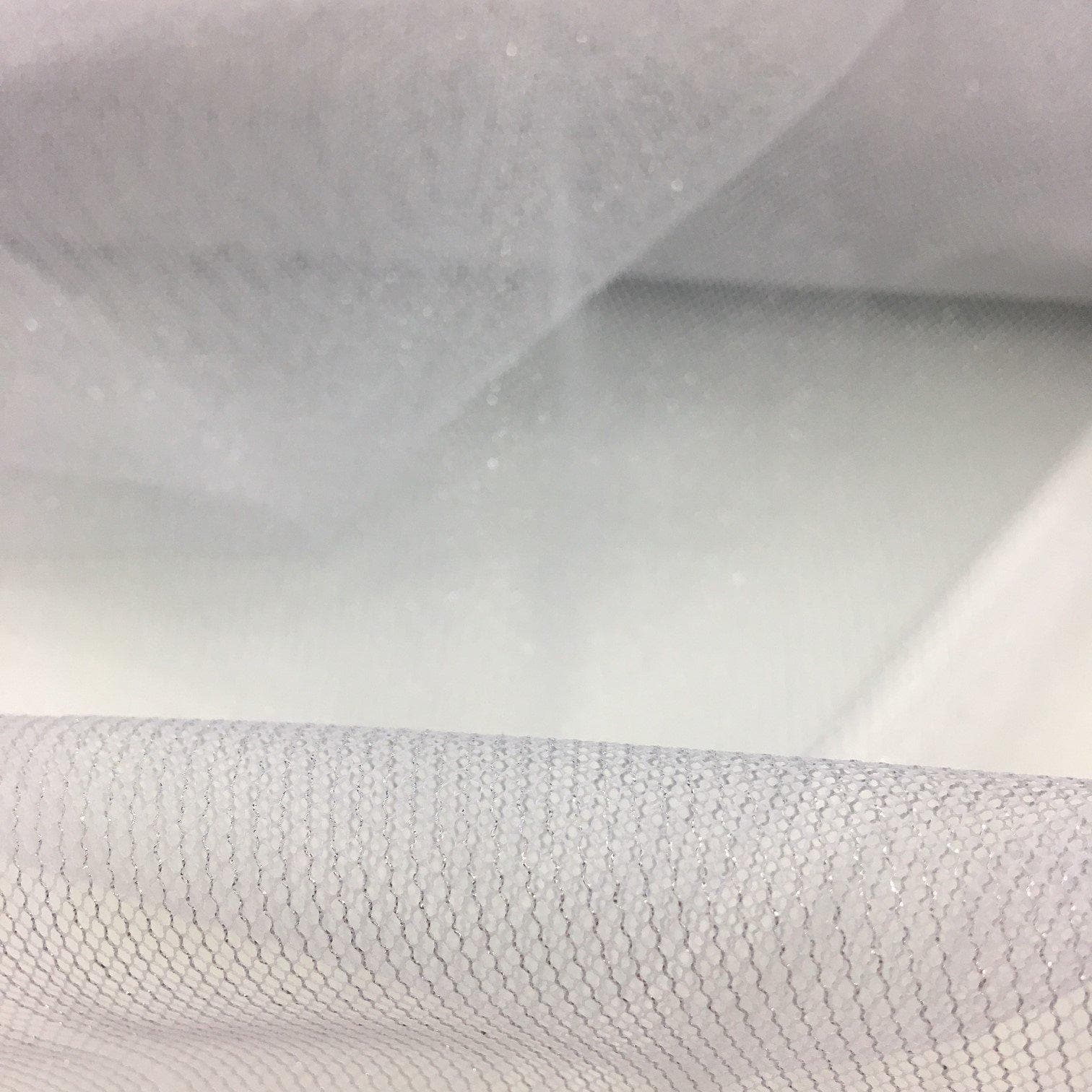 Ivory Silver Lurex Tulle — soft, 90% polyester 10% lurex, 137cm wide