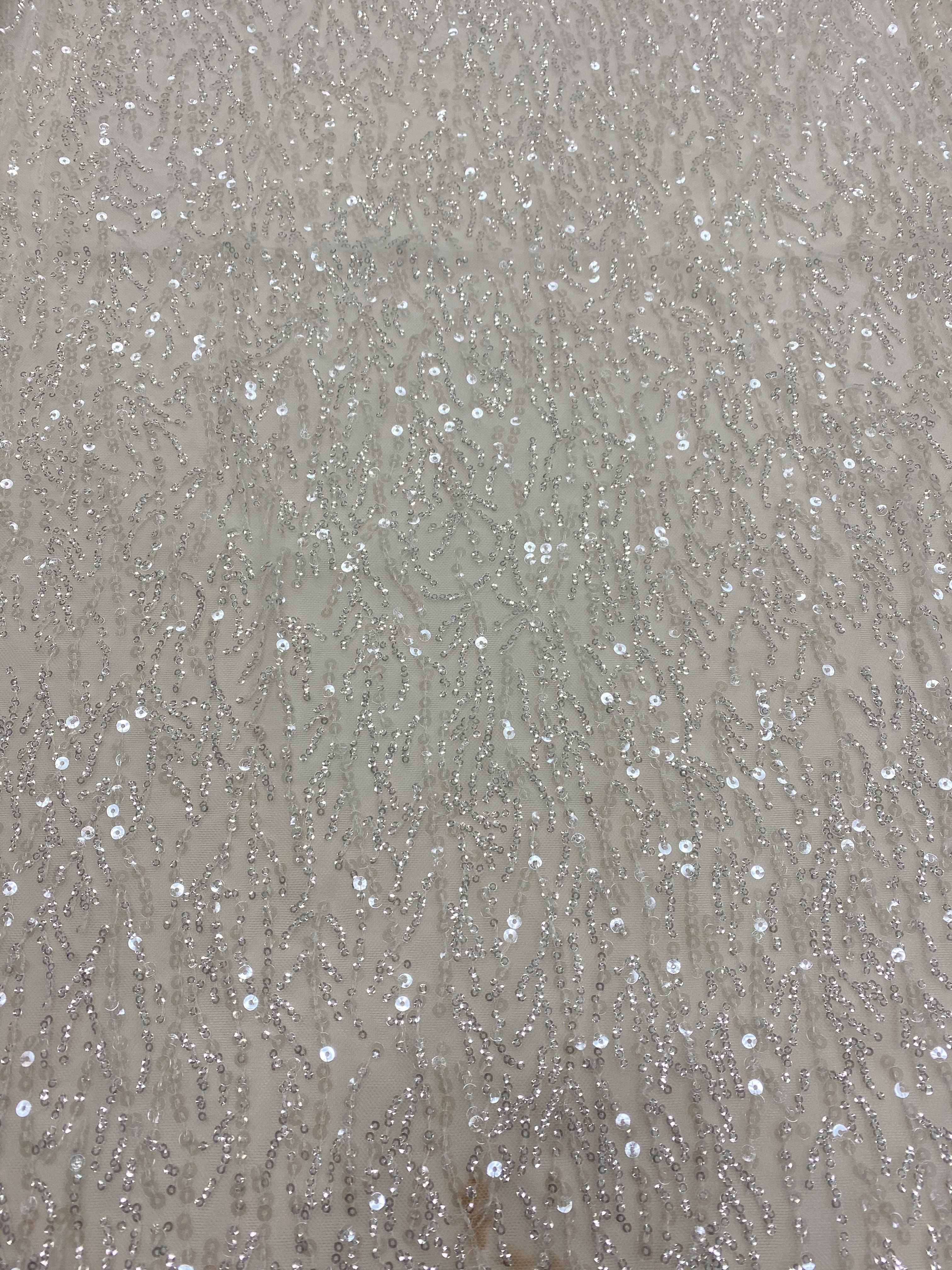 Ivory Sequined Tulle — featuring sequins, 60% rayon 40% nylon, 130cm wide