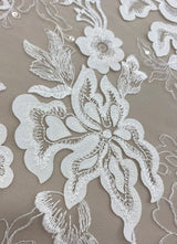 Ivory Embellished Tulle — featuring floral motifs, a border design and sequins, 30% nylon 60% rayon 10% polyester, 130cm wide