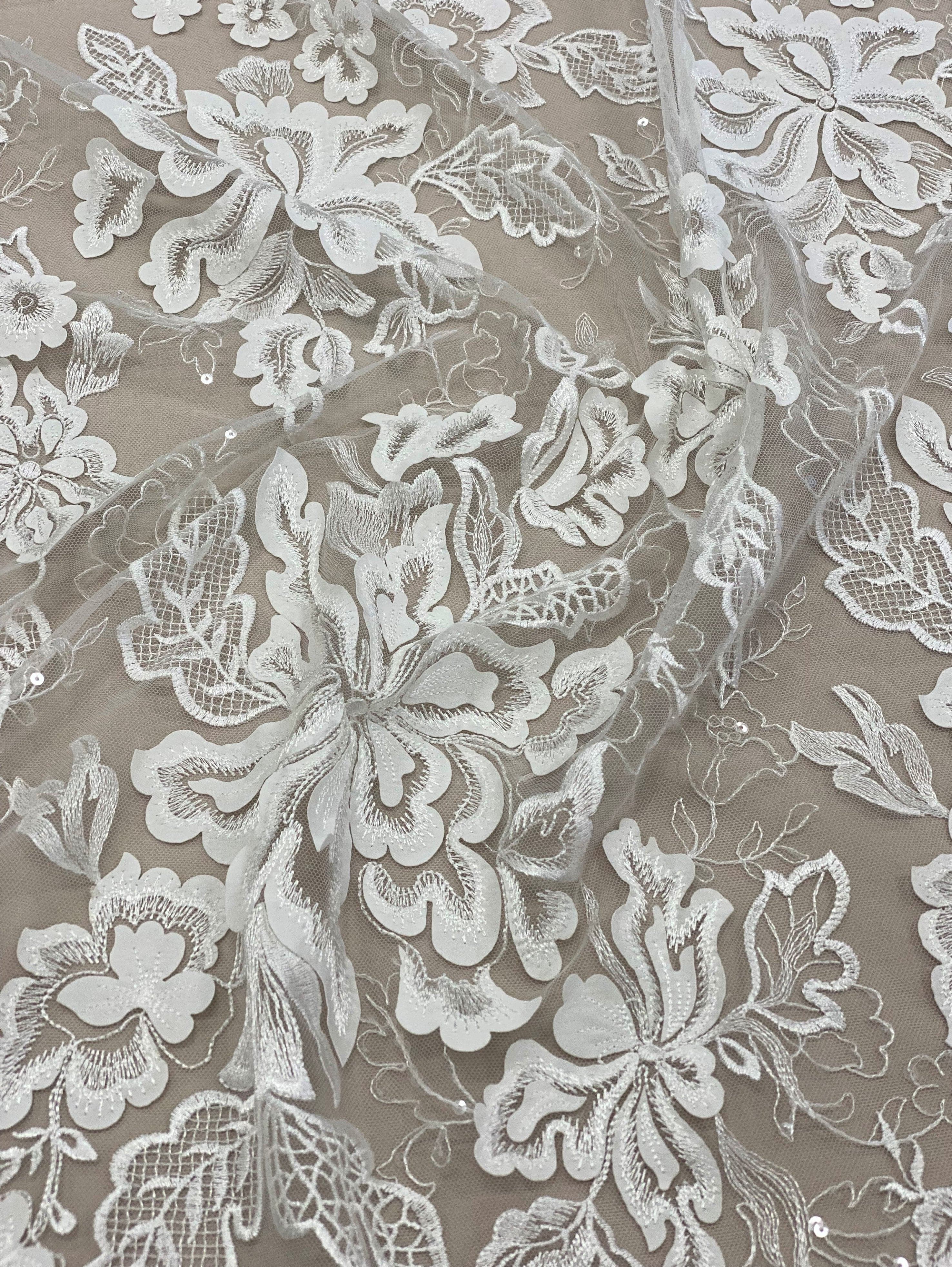Ivory Embellished Tulle — featuring floral motifs, a border design and sequins, 30% nylon 60% rayon 10% polyester, 130cm wide