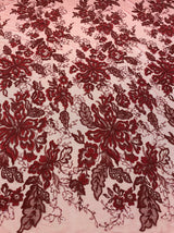 Wine Embellished Tulle — featuring floral motifs, a border design and sequins, 30% nylon 60% rayon 10% polyester, 130cm wide