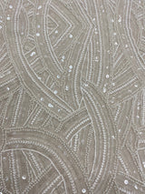 Ivory Embellished Tulle — featuring scalloped edges, hand-beading and sequins, 50% rayon 50% nylon, 130cm wide