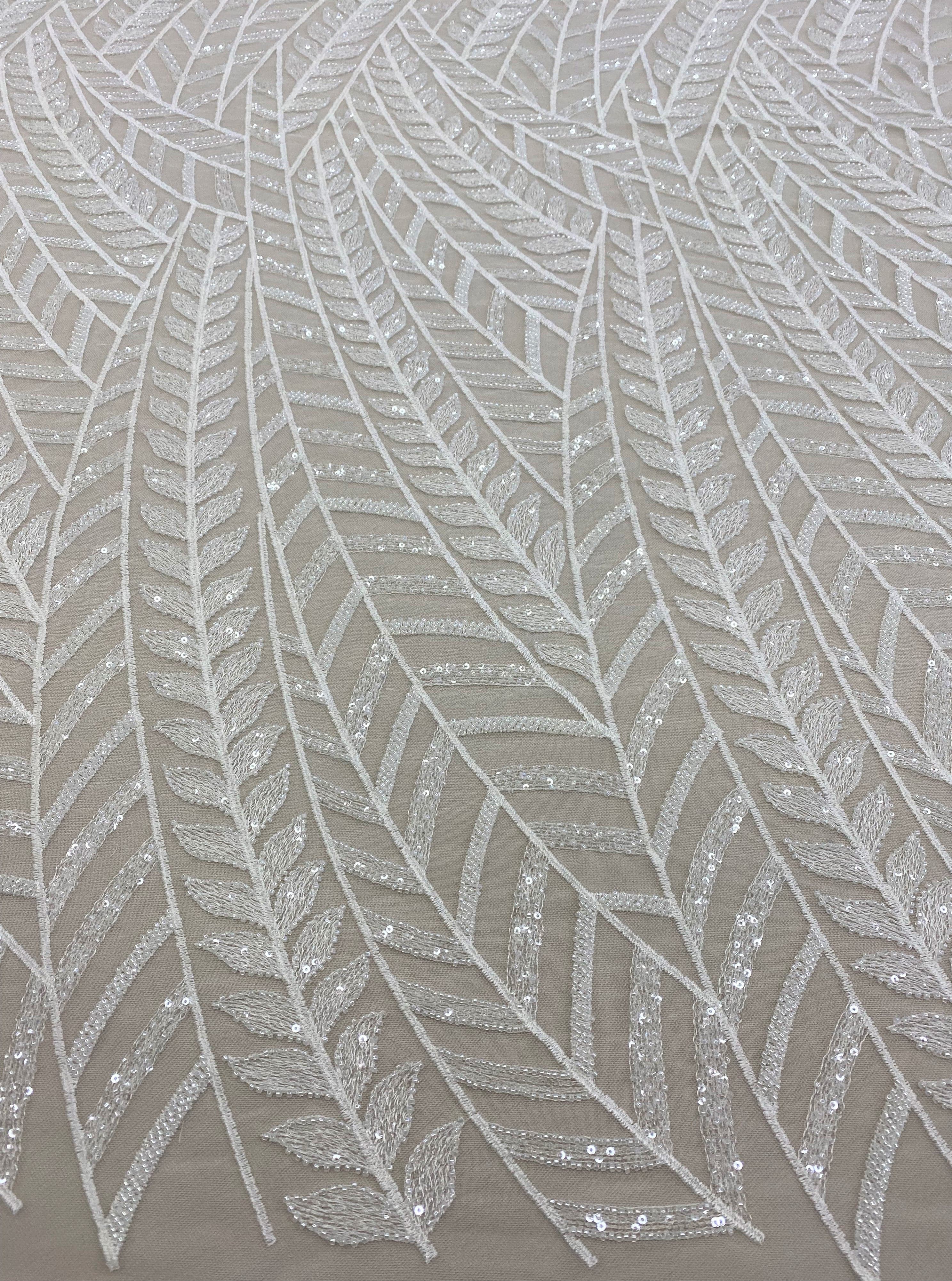 Ivory Embroidered Tulle — soft, 50% nylon 50% rayon, 130cm wide