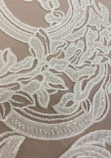 Ivory Embroidered Tulle — featuring floral motifs, hand-beading and sequins, 50% nylon 50% rayon, 130cm wide