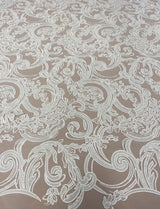 Ivory Embroidered Tulle — featuring floral motifs, hand-beading and sequins, 50% nylon 50% rayon, 130cm wide