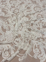 Ivory Embroidered Tulle — featuring floral motifs, hand-beading and sequins, 50% nylon 50% rayon, 130cm wide