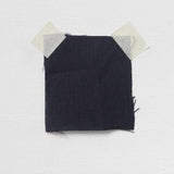 Navy Linen — mid-weight plain-weave linen with a slightly crisp handle that softens with wear, 100% linen, 135cm wide