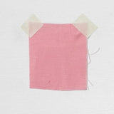 Rose Linen — mid-weight plain-weave linen with a slightly crisp handle that softens with wear, 100% linen, 135cm wide