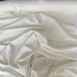Ivory Scuba — a smooth, mid-weight scuba knit with a soft stretch