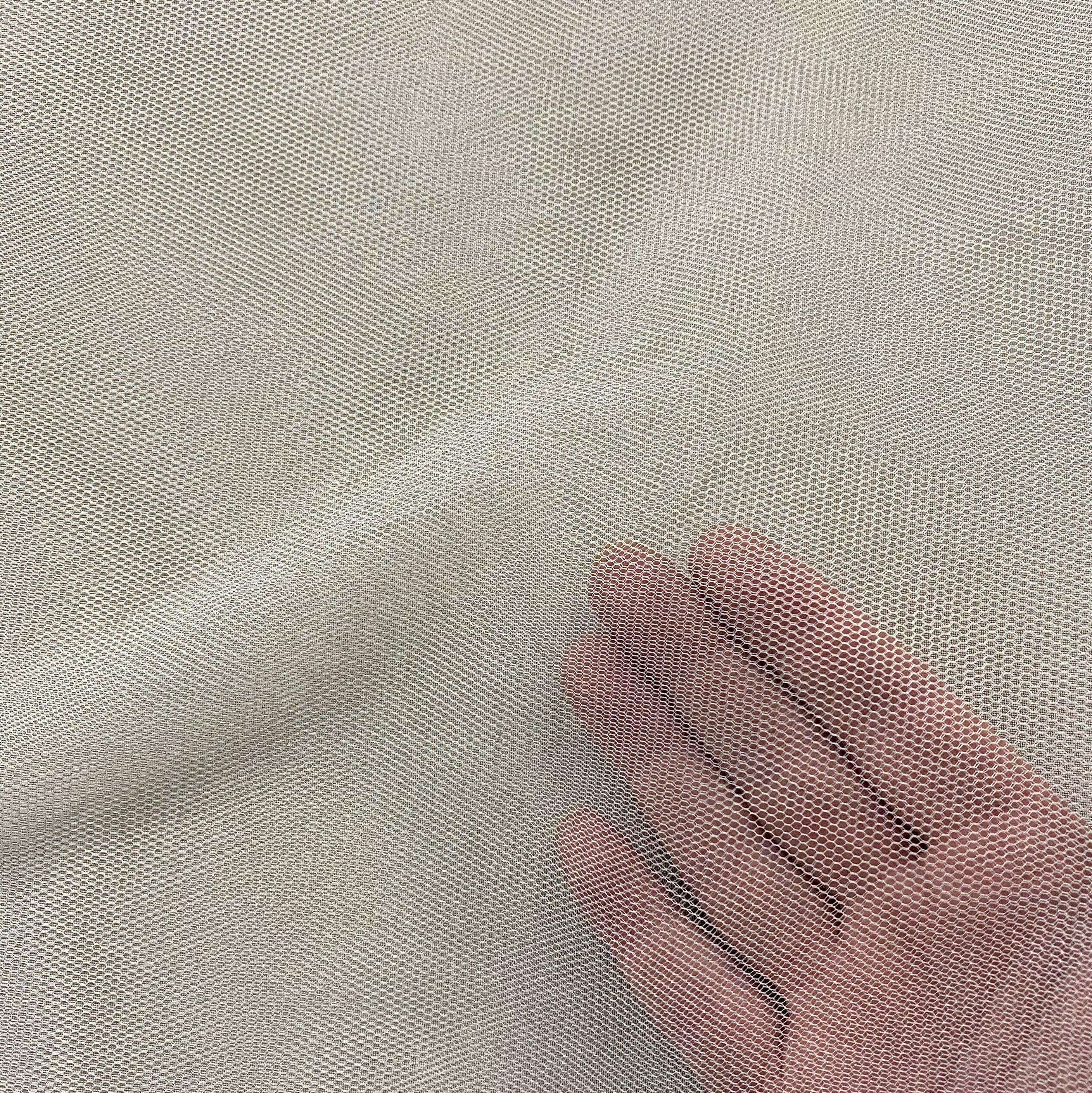 Ivory Soft Tulle — lightweight and soft, 100% polyester, 300cm wide