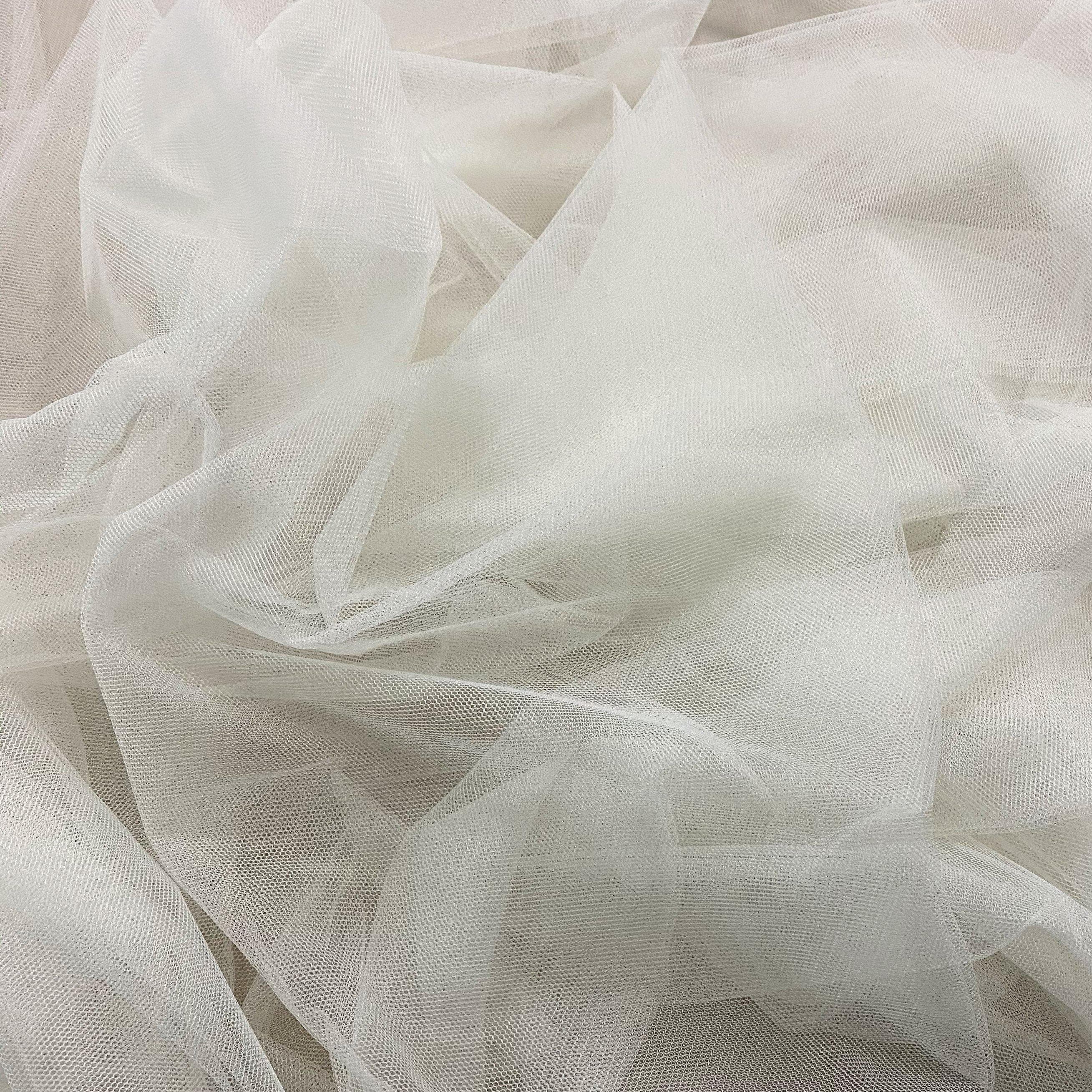 Ivory Soft Tulle — lightweight and soft, 100% polyester, 300cm wide
