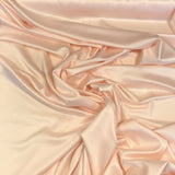 Antique Pink Stretch Polyester Lining — lightweight with a satin finish, matte reverse and gentle stretch, in polyester