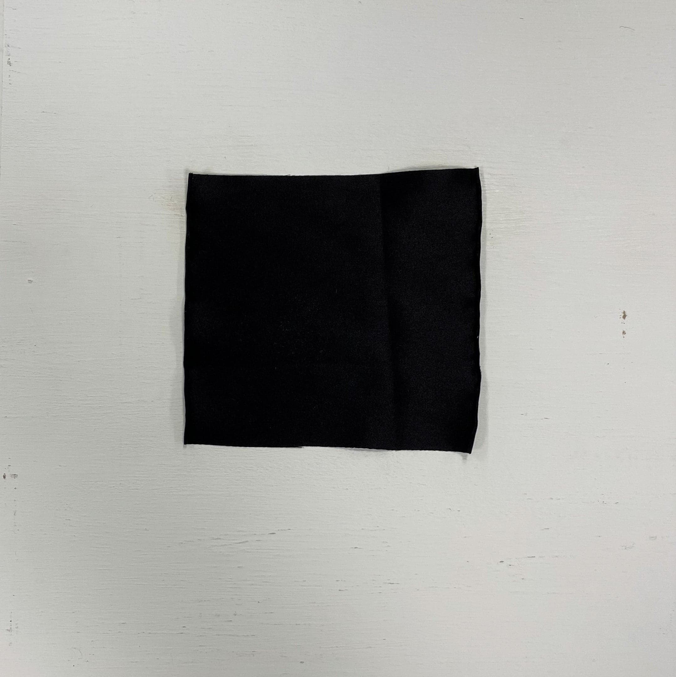 Black Stretch Polyester Lining — lightweight with a satin finish, matte reverse and gentle stretch, in polyester