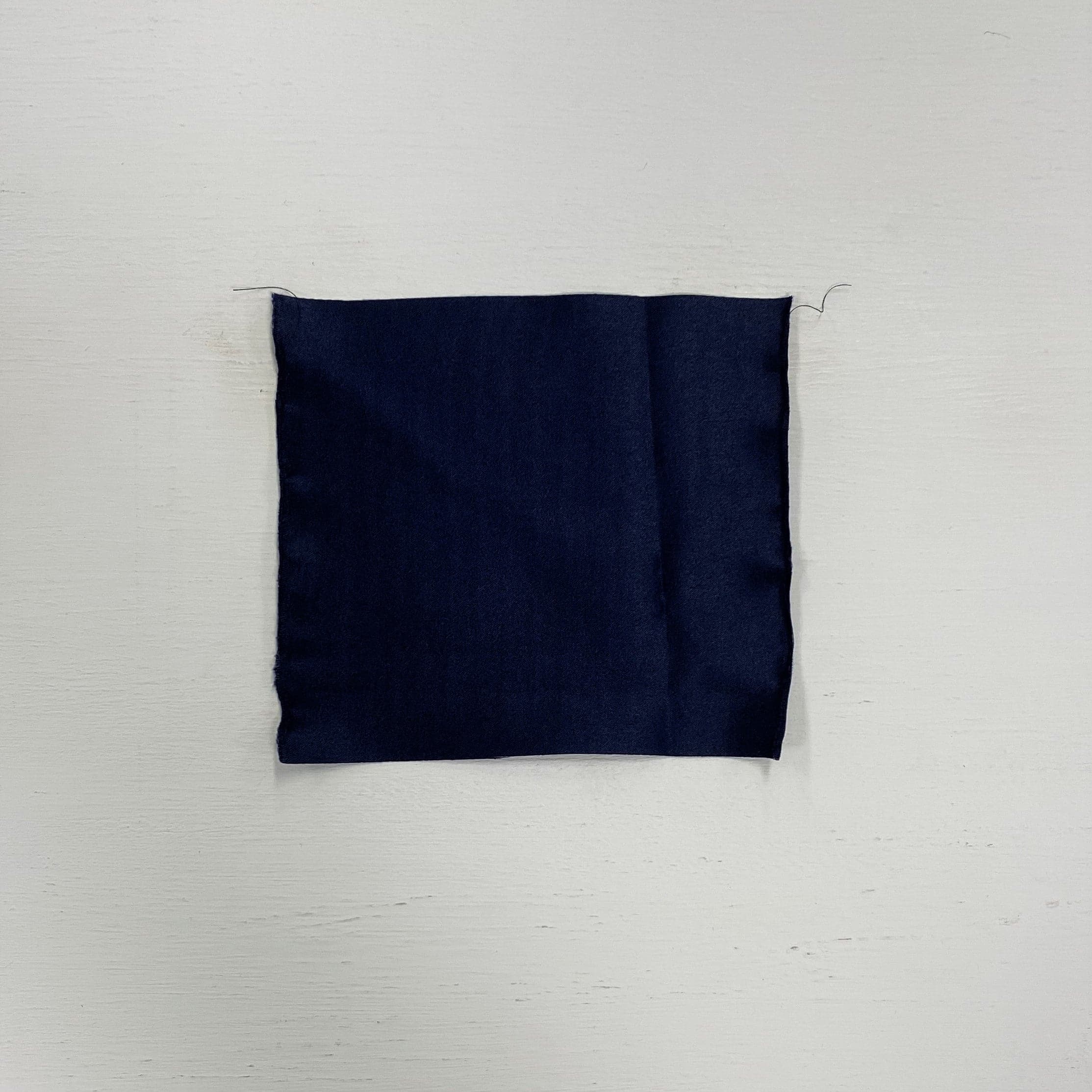 Navy Stretch Polyester Lining — lightweight with a satin finish, matte reverse and gentle stretch, in polyester
