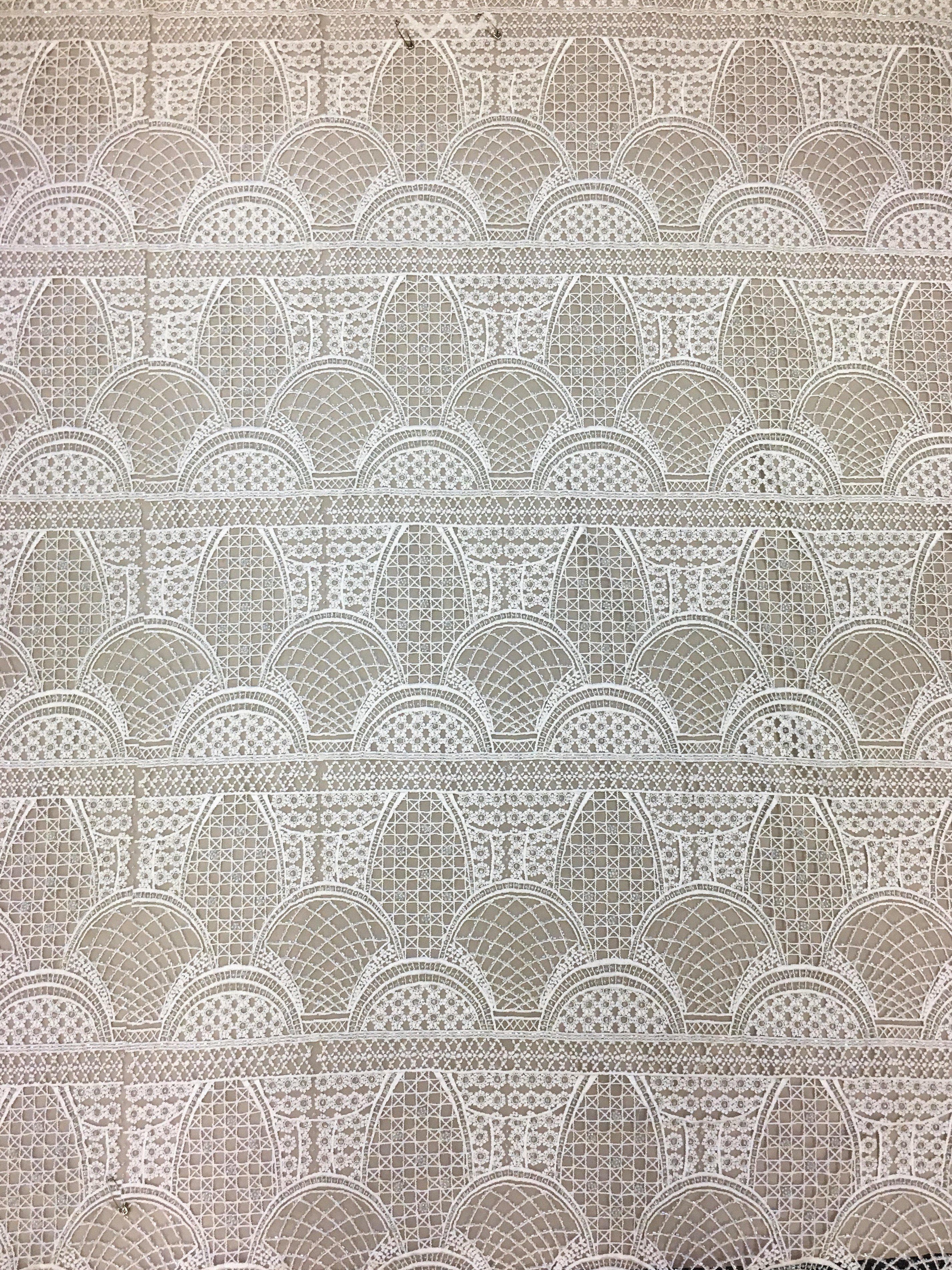 Ivory Geometric Embellished Tulle — featuring geometric motifs and hand-beading, 100% nylon, 120cm wide