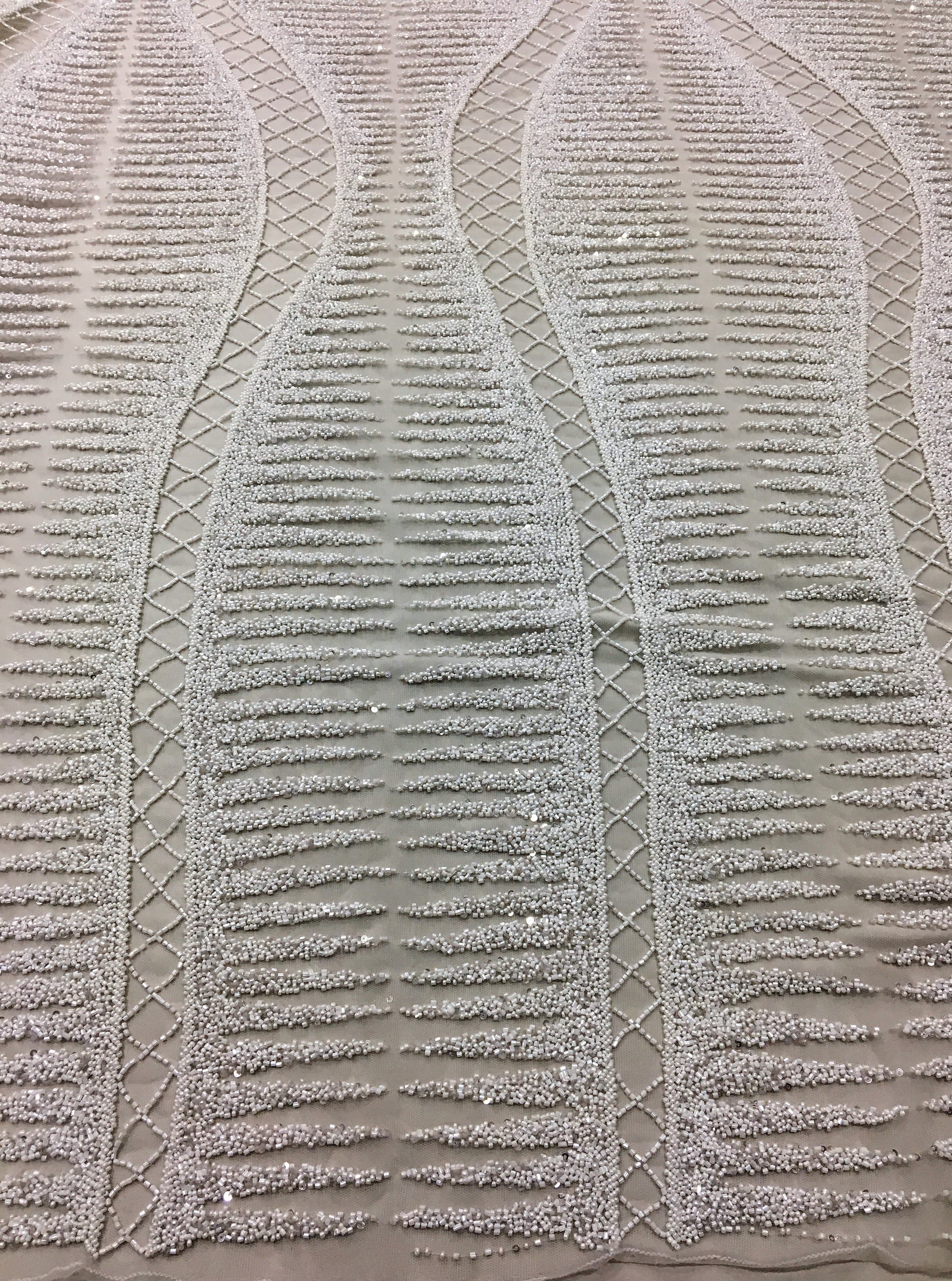 Ivory Ornamental Hand Beaded Tulle — featuring hand-beading and sequins, 100% nylon, 125cm wide