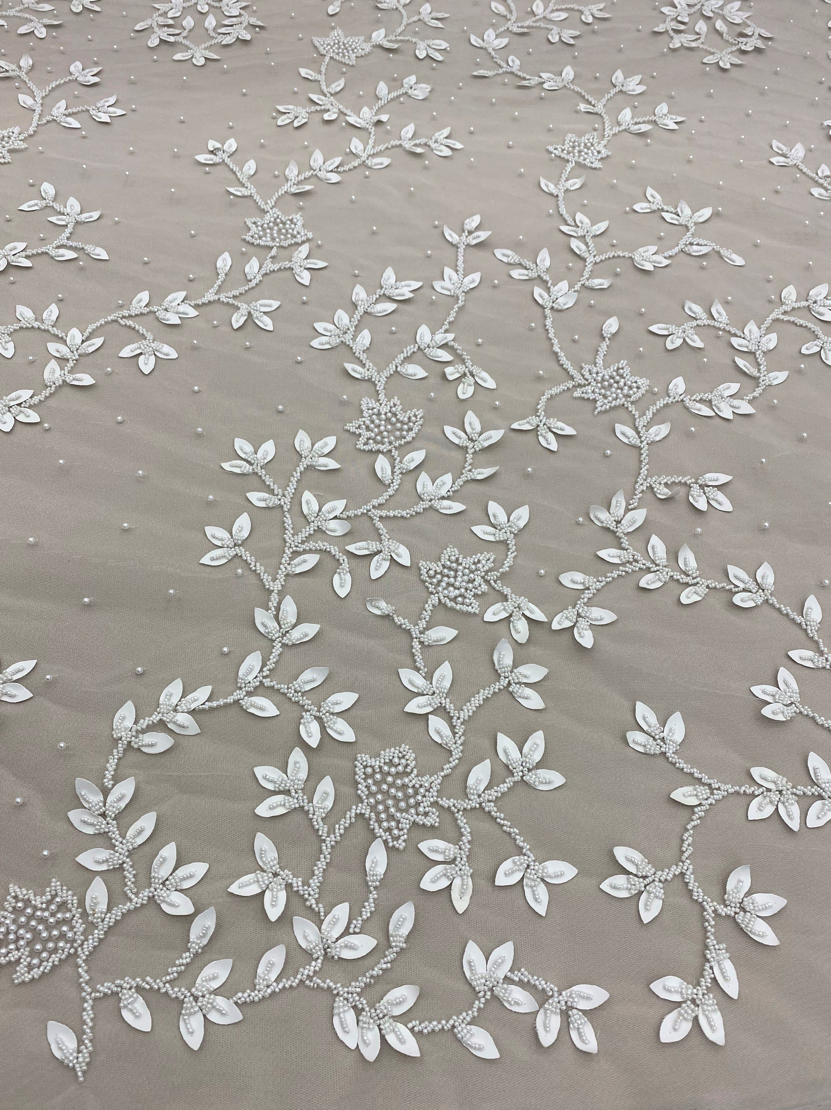 Ivory Leather Floral Embellished Tulle — featuring floral motifs and hand-beading, 100% nylon, 125cm wide