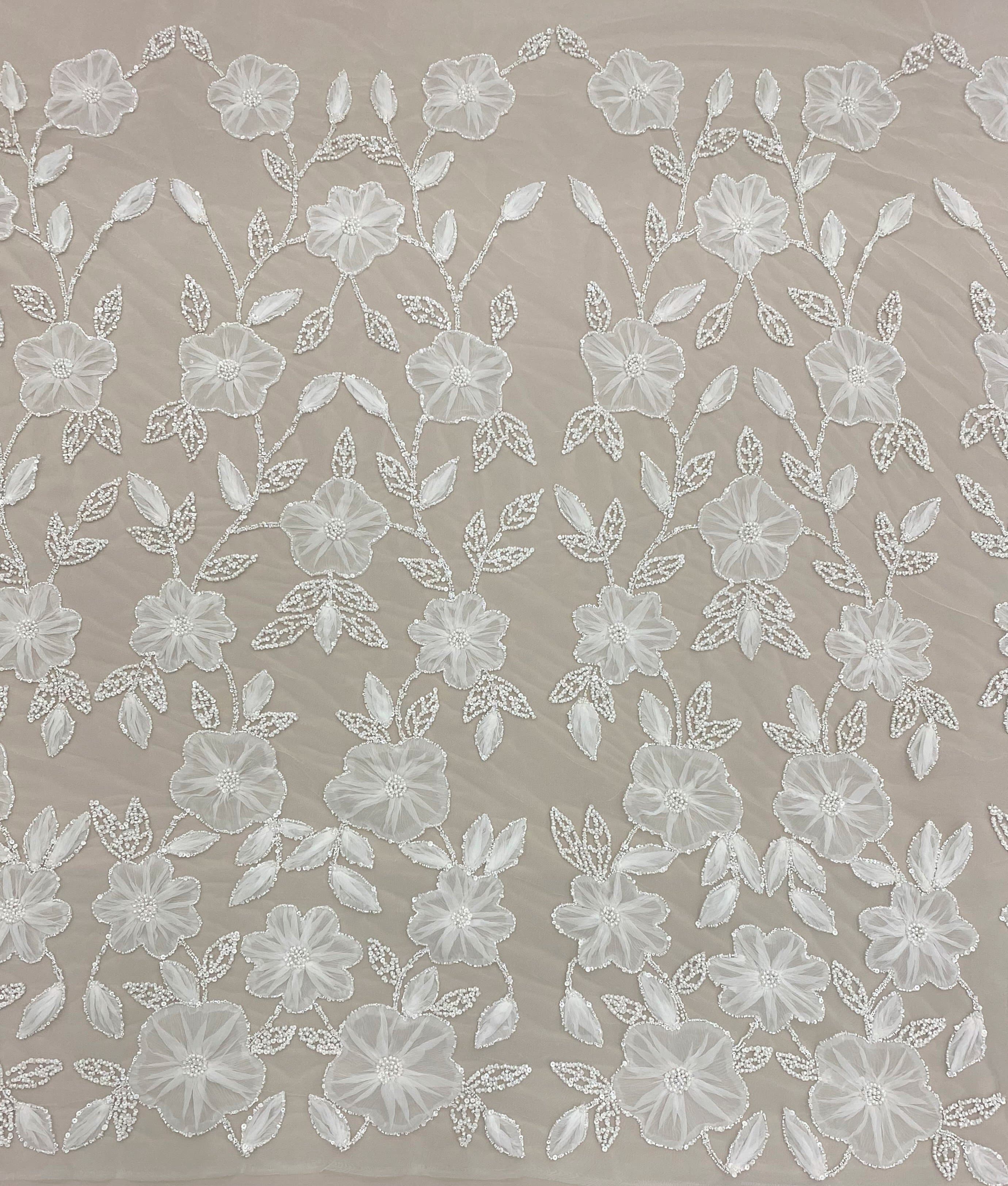 Ivory Embellished Tulle — featuring floral motifs, hand-beading and sequins, 100% nylon, 125cm wide