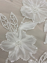 Ivory Embellished Tulle — featuring floral motifs, hand-beading and sequins, 100% nylon, 125cm wide