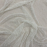 Ivory Beaded Tulle — featuring hand-beading, 100% nylon, 125cm wide