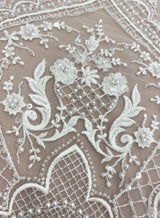 Ivory Embellished Tulle — featuring floral motifs, hand-beading and sequins, 60% rayon 40% nylon, 140cm wide