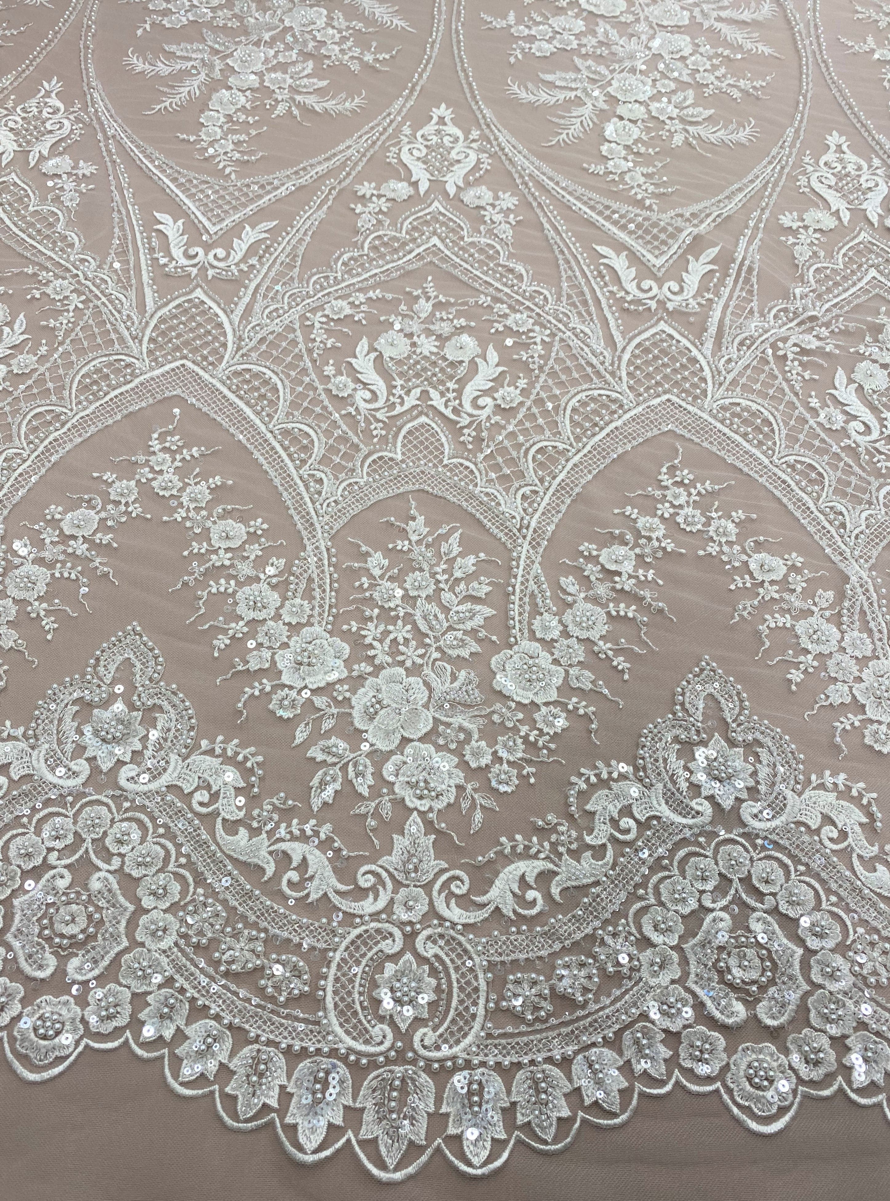 Ivory Embellished Tulle — featuring floral motifs, hand-beading and sequins, 60% rayon 40% nylon, 140cm wide