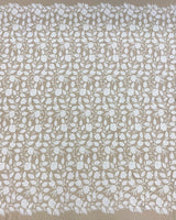 Ivory Embroidered Applique Tulle — featuring scalloped edges, floral motifs and a leaf design, 40% nylon 40% polyester 20% cotton, 130cm wide