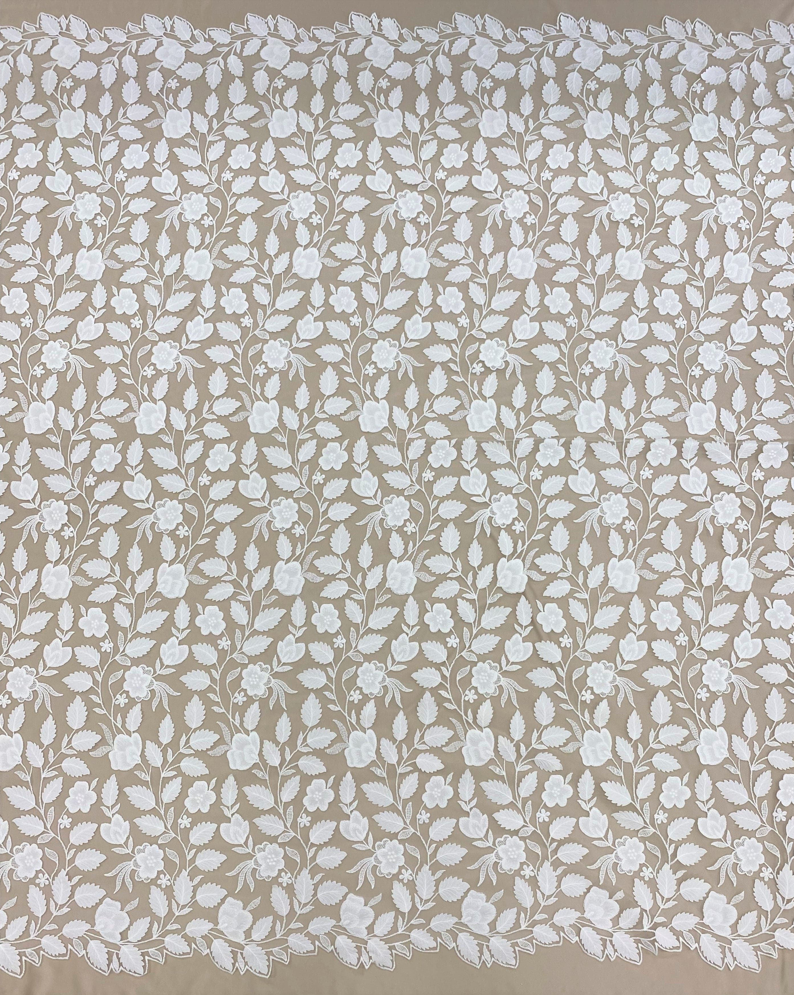 Ivory Embroidered Applique Tulle — featuring scalloped edges, floral motifs and a leaf design, 40% nylon 40% polyester 20% cotton, 130cm wide