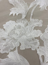 Ivory Floral Embroidered Tulle — featuring floral motifs, 50% nylon 50% rayon, 135cm wide