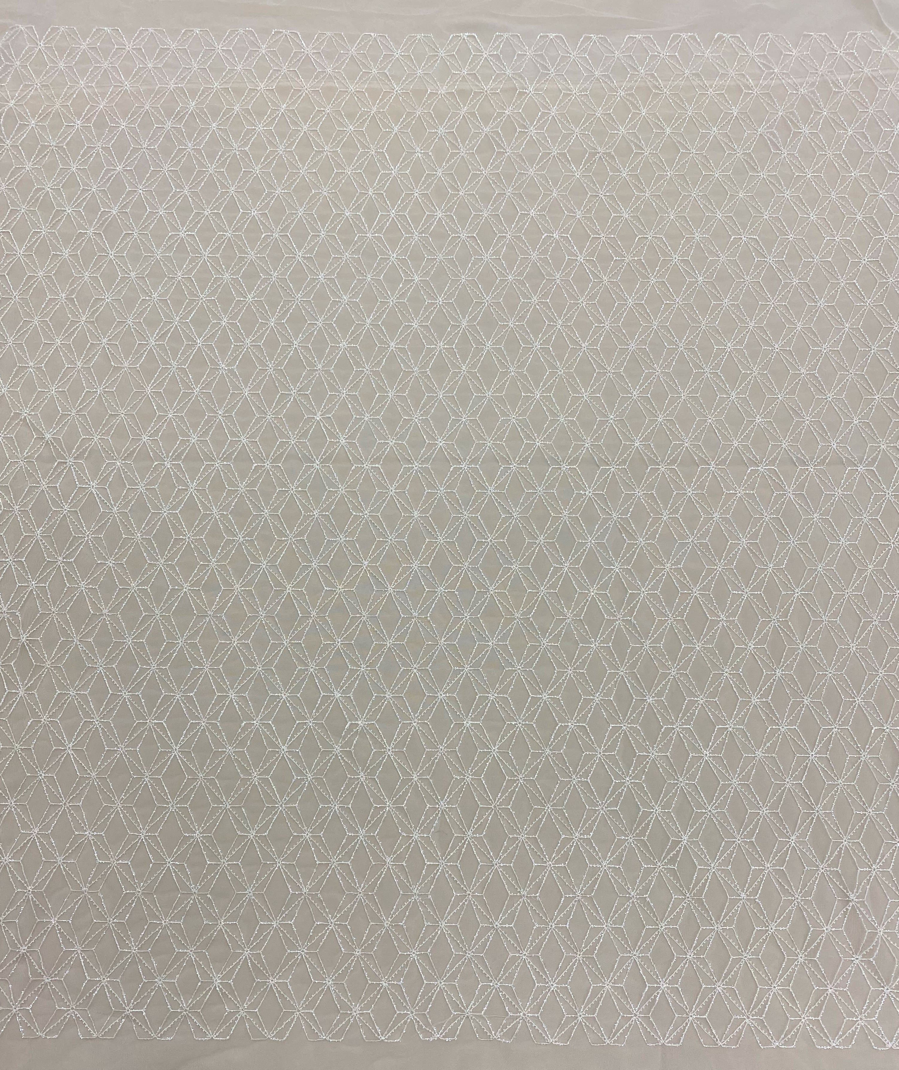 Ivory Beaded Tulle — featuring geometric motifs and hand-beading, 60% nylon 40% polyester, 130cm wide