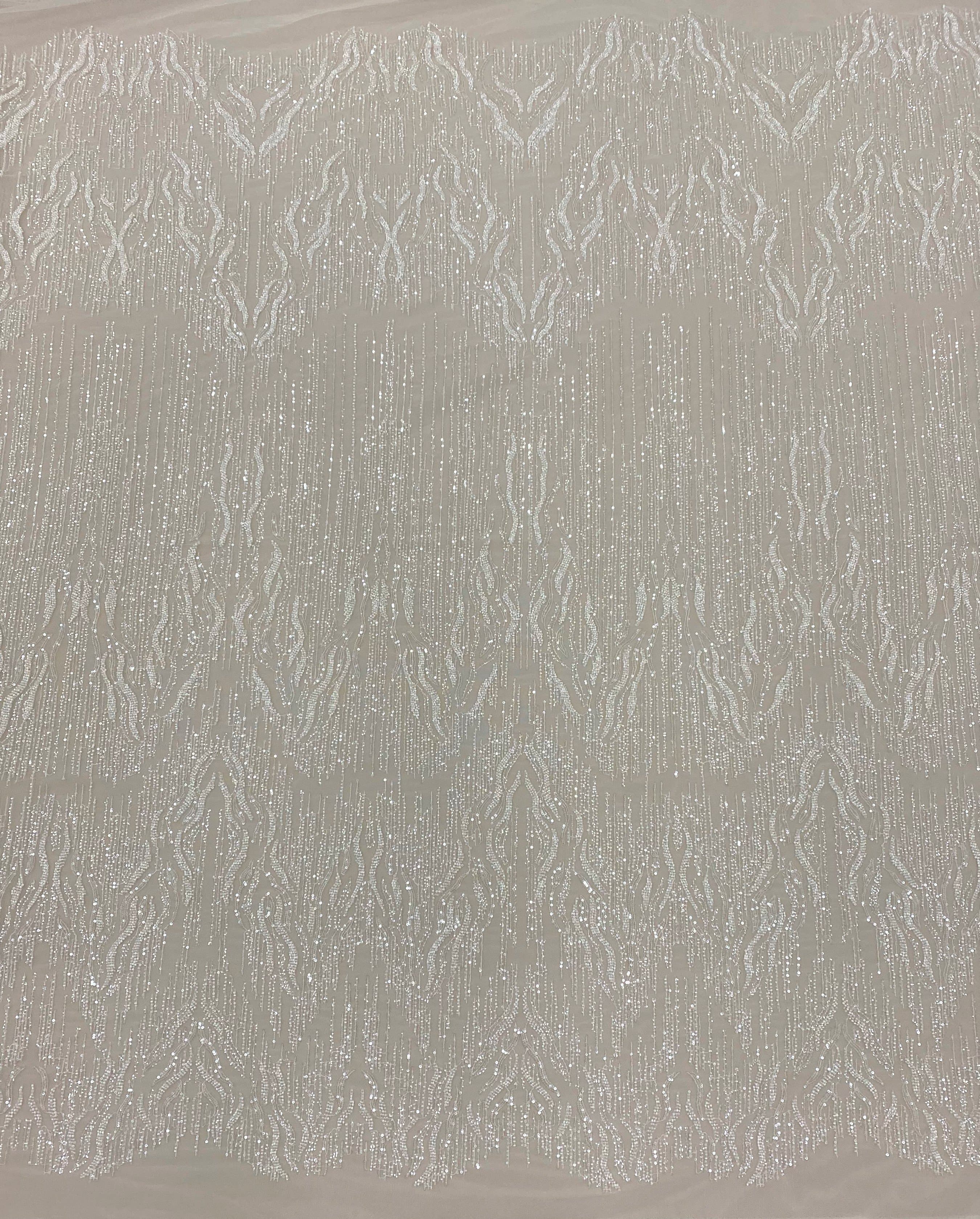 Ivory Embellished Tulle — featuring hand-beading and sequins, 60% nylon 40% polyester, 130cm wide