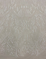 Ivory Embellished Tulle — featuring hand-beading and sequins, 60% nylon 40% polyester, 130cm wide