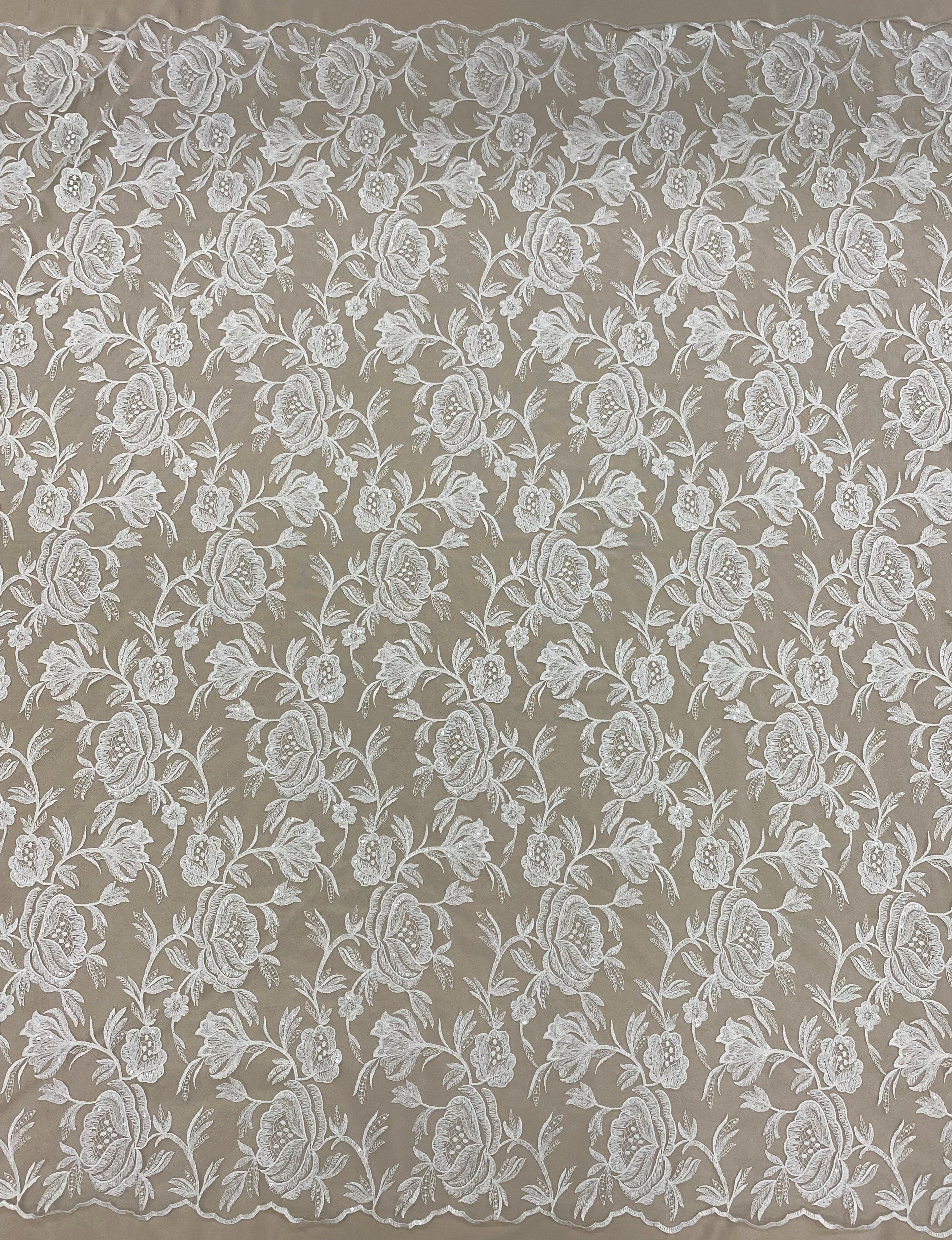 Ivory Embroidered Tulle — featuring scalloped edges, floral motifs and sequins, 50% nylon 50% polyester, 130cm wide