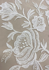 Ivory Embroidered Tulle — featuring scalloped edges, floral motifs and sequins, 50% nylon 50% polyester, 130cm wide