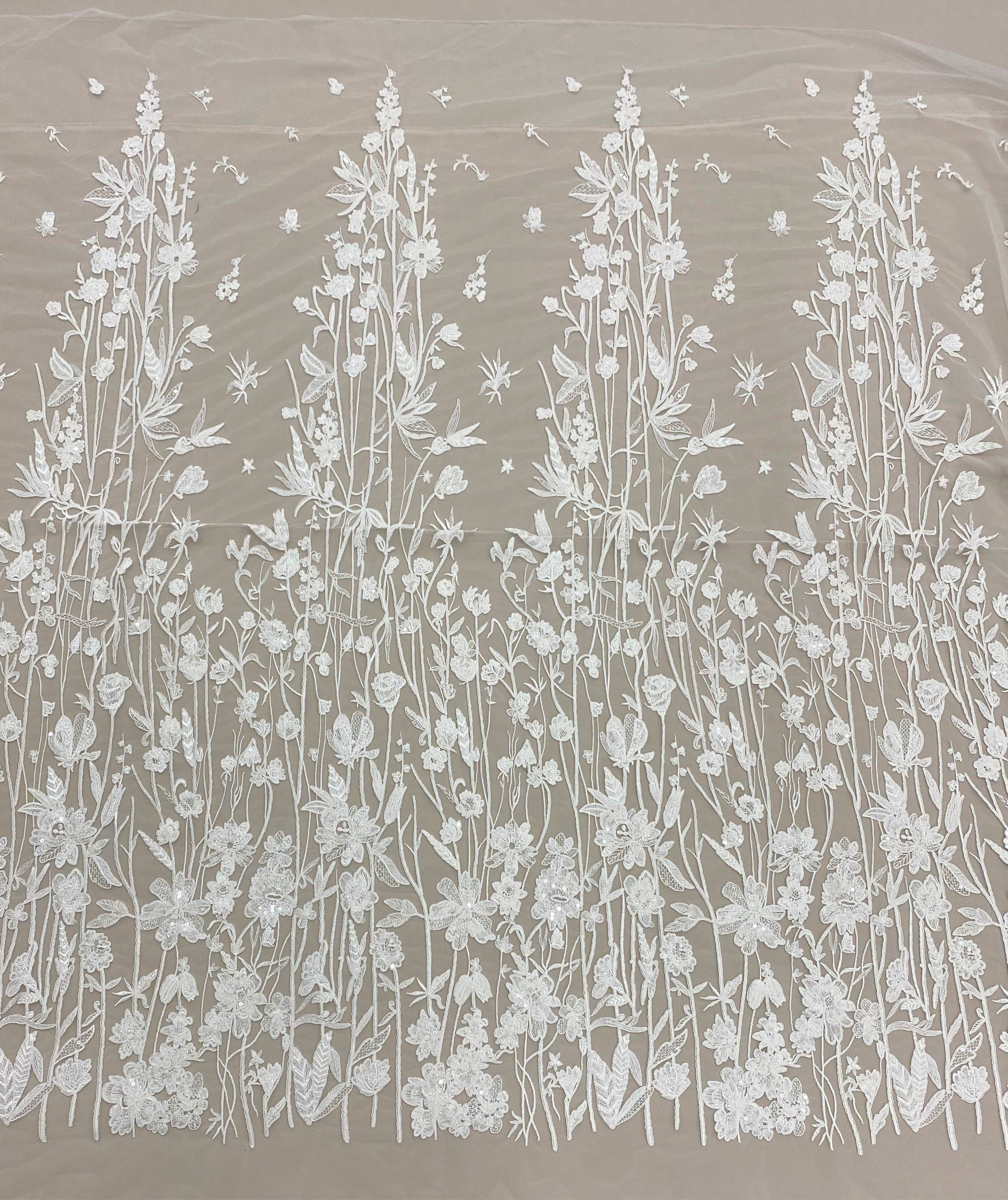 Ivory Embroidered Floral Tulle — featuring floral motifs and sequins, 50% nylon 50% rayon, 130cm wide