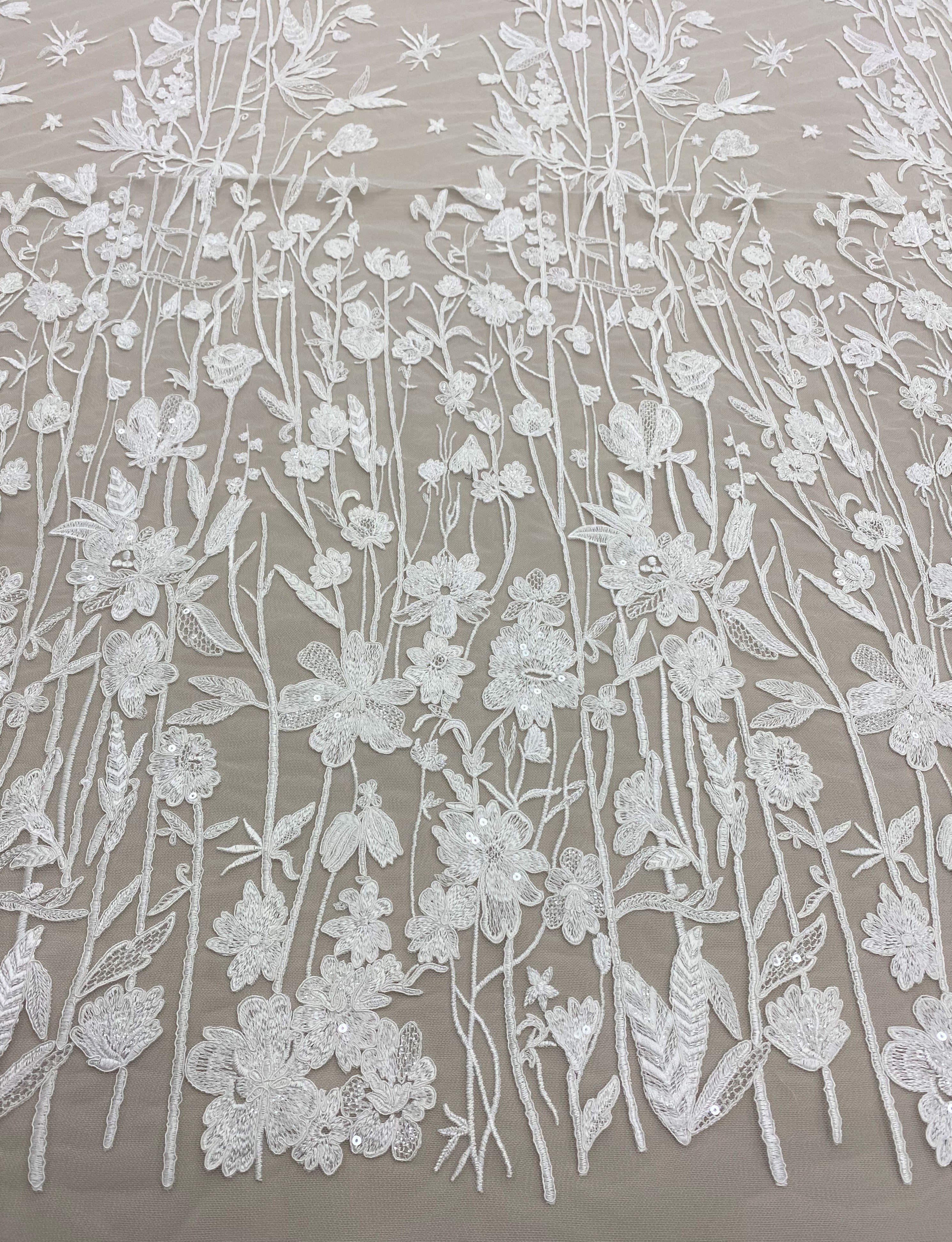 Ivory Embroidered Floral Tulle — featuring floral motifs and sequins, 50% nylon 50% rayon, 130cm wide