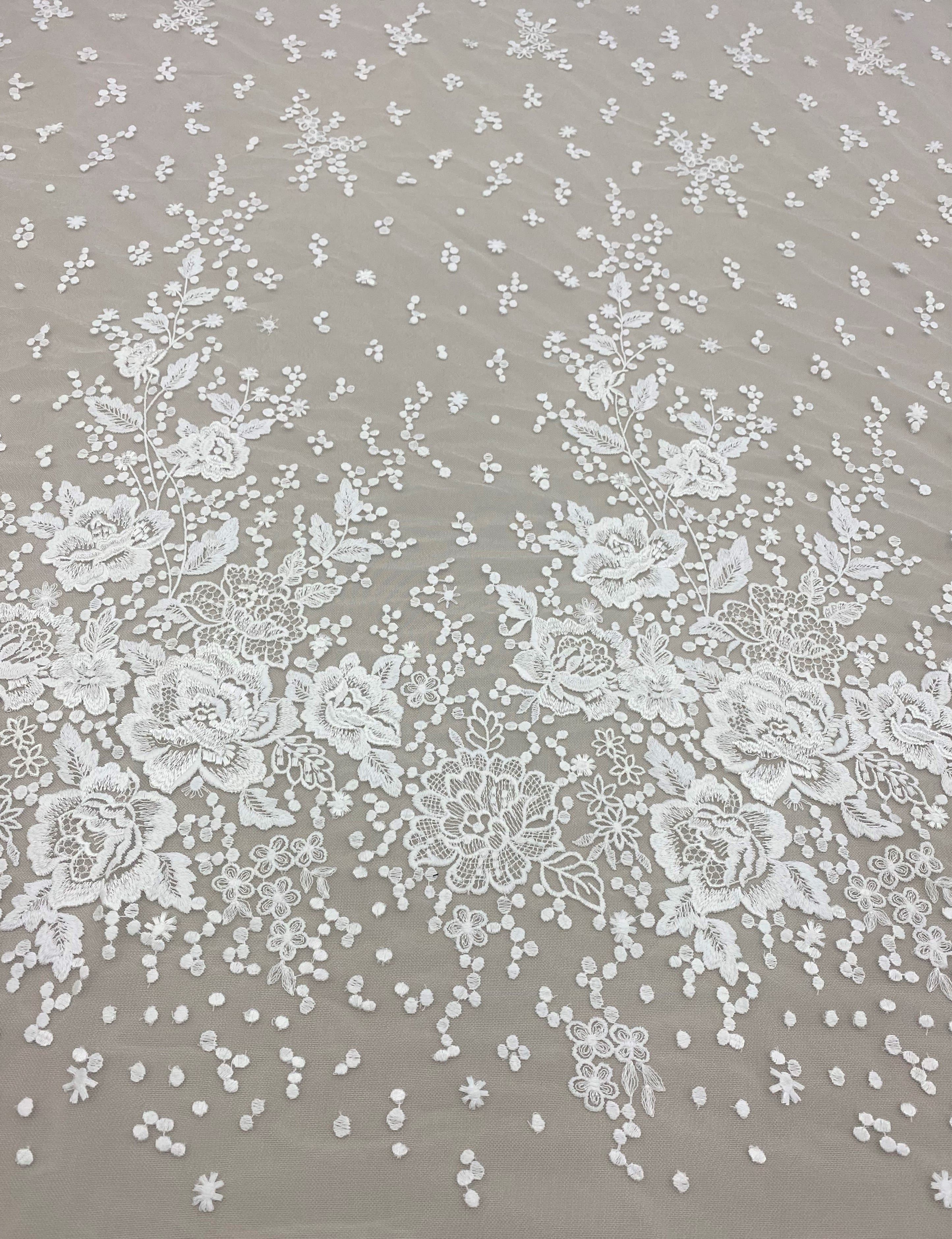 Ivory Embroidered Tulle — featuring floral motifs, 50% nylon 50% rayon, 135cm wide
